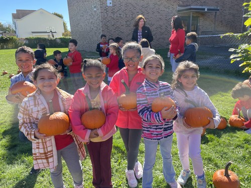 Mary G. Clarkson students picked pumpkins from a pumpkin patch at the building.