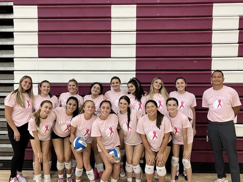 The Girls Volleyball program hosted a DIG PINK game.
