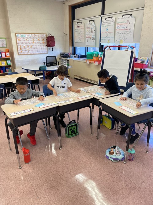Brook Avenue students practiced sequencing letters.