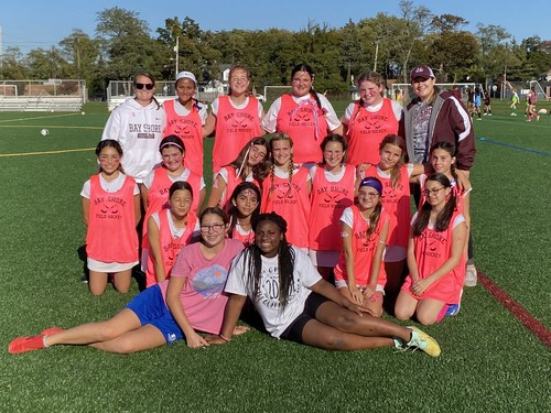 The Middle School Field Hockey team held a breast cancer game.