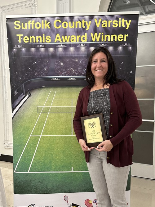 ֱ's Girls Varsity Tennis coach has been named Tennis Coach of the Year.