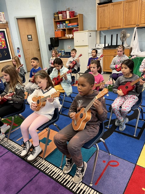 Fifth Avenue students are learning to play the ukulele.