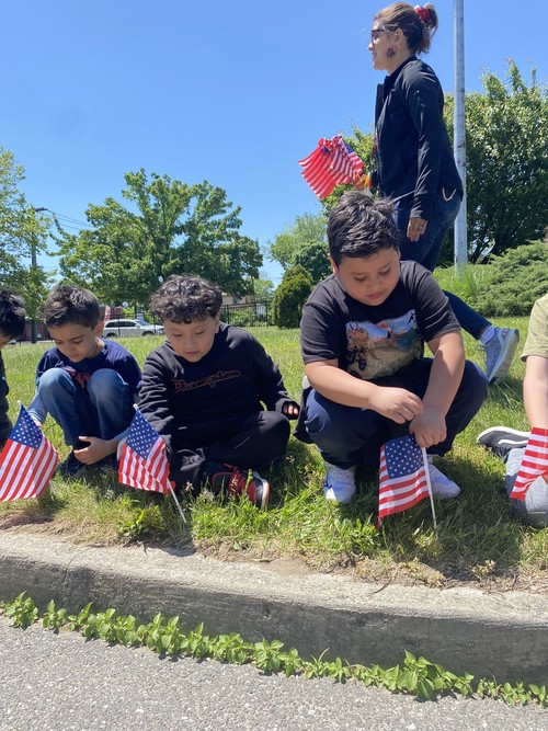 Fifth Avenue students placed flags for Memorial Day.