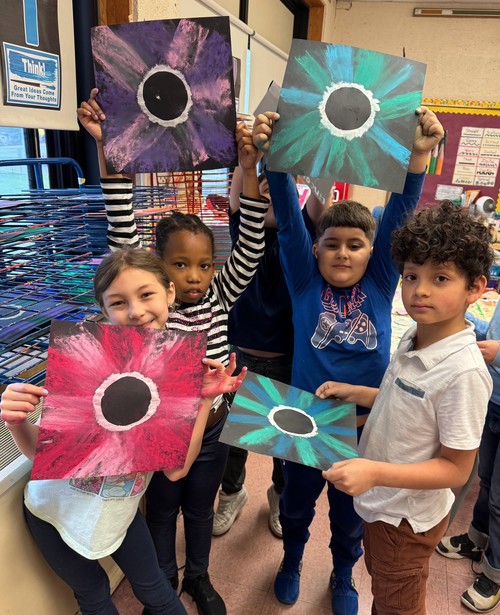Brook Avenue students created eclipse-inspired art.
