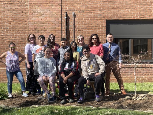 Students and staff planted flowers at the Middle School.