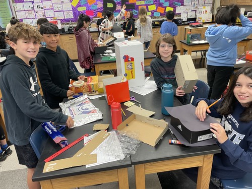 Middle School students learned about renewable energy and built solar ovens.